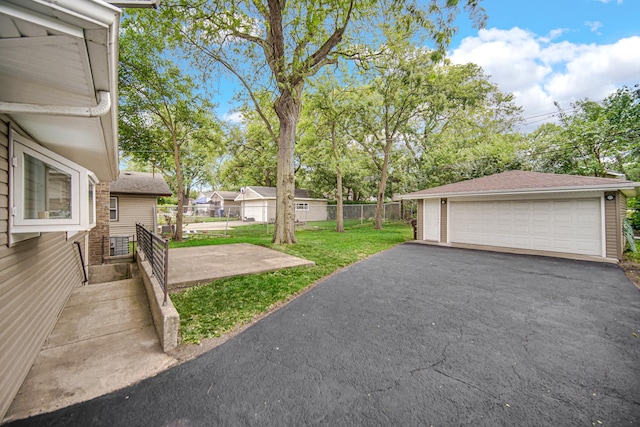 3115 172nd St, Hazel Crest, IL 60429 - view of yard with a detached garage and an outdoor structure