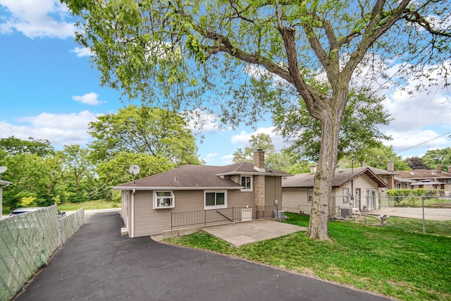 3115 172nd St, Hazel Crest, IL 60429 - view of front of property with a chimney and a patio