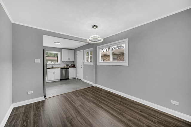 3115 172nd St, Hazel Crest, IL 60429 - unfurnished living room with dark wood finished floors, a chandelier, and ornamental molding