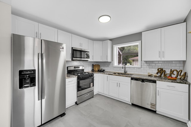 3115 172nd St, Hazel Crest, IL 60429 - kitchen featuring stainless steel appliances, stone countertops, and white cabinetry
