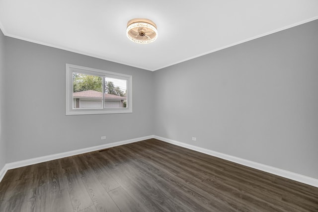3115 172nd St, Hazel Crest, IL 60429 - spare room featuring crown molding and dark wood-type flooring