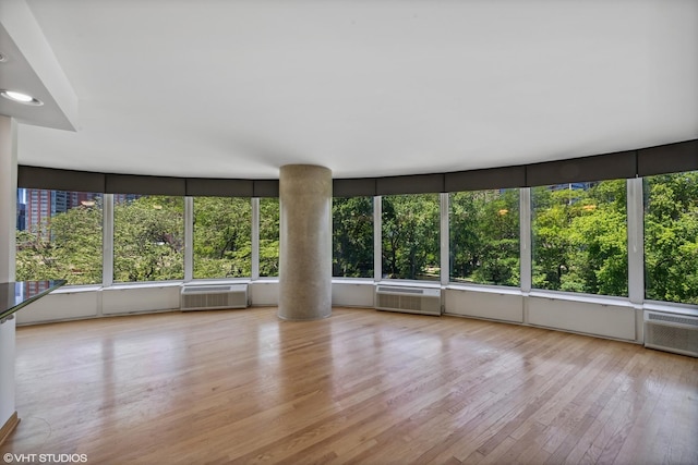 505 N Lake Shore Dr Unit 516, Chicago, IL 60611 - unfurnished sunroom featuring an AC wall unit and plenty of natural light