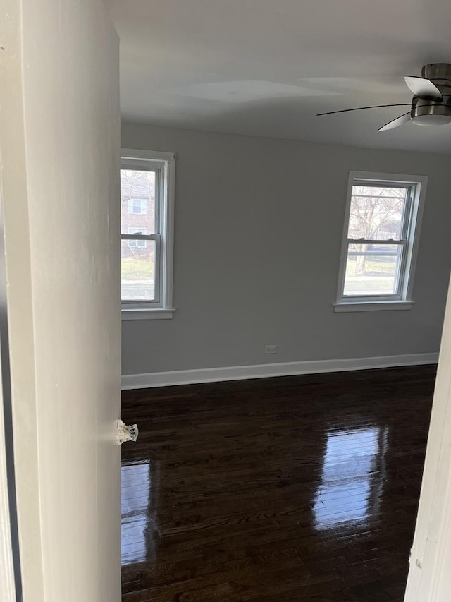 9611 S Chappel Ave, Chicago, IL 60617 - spare room with dark wood-type flooring and ceiling fan