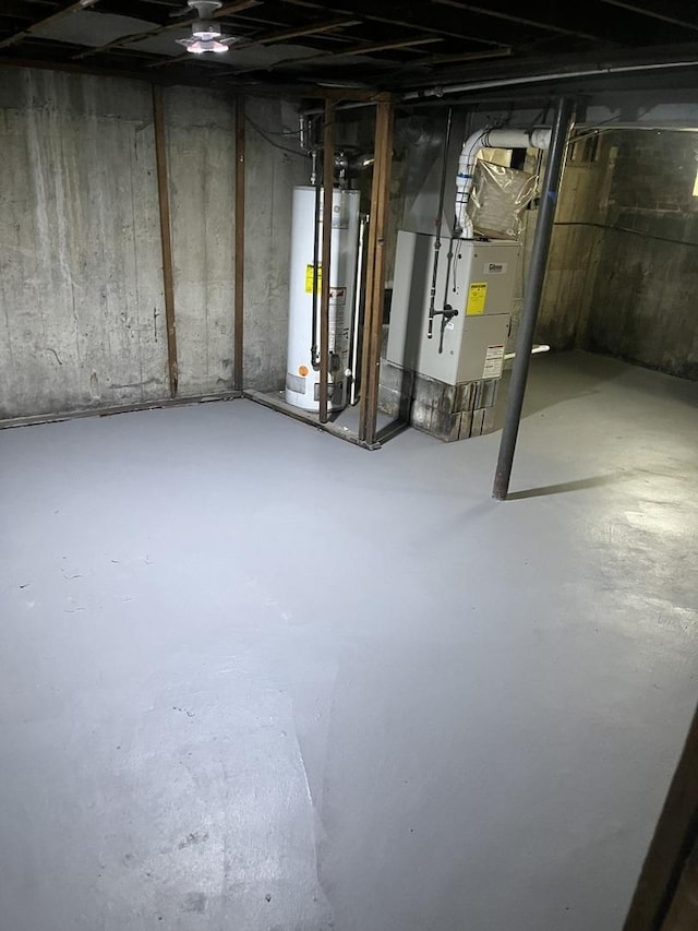 9611 S Chappel Ave, Chicago, IL 60617 - unfinished below grade area featuring water heater and heating unit