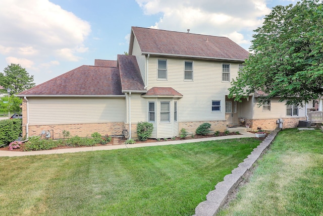 2007 Thornwood Cir, Saint Charles, IL 60174 - view of front of property with brick siding, a front lawn, and a shingled roof