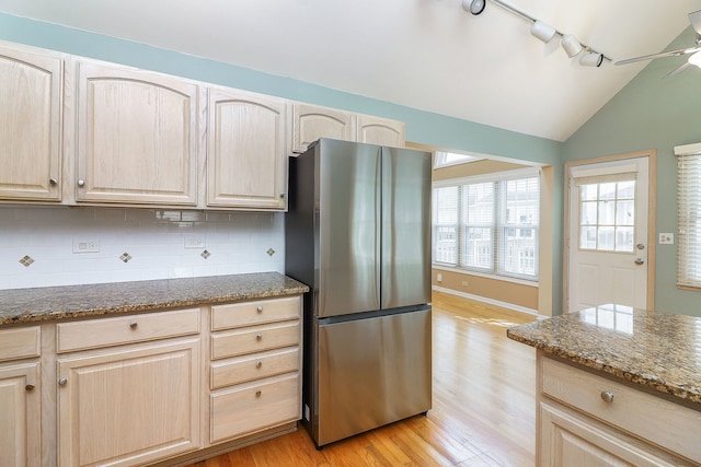 2007 Thornwood Cir, Saint Charles, IL 60174 - kitchen featuring freestanding refrigerator, light brown cabinets, light wood-style flooring, track lighting, and lofted ceiling