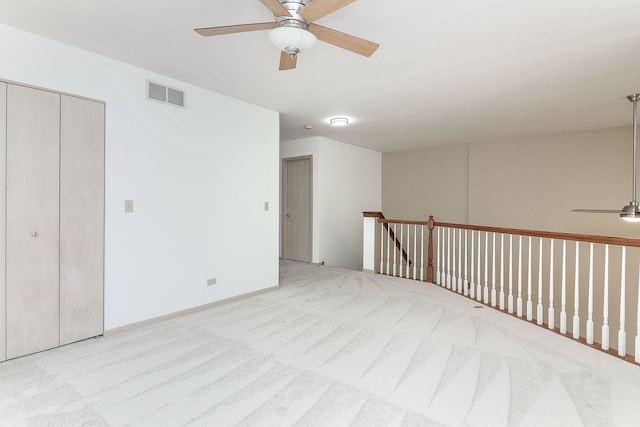 2007 Thornwood Cir, Saint Charles, IL 60174 - empty room with a ceiling fan and carpet floors