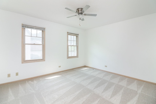 2007 Thornwood Cir, Saint Charles, IL 60174 - empty room with light carpet and ceiling fan