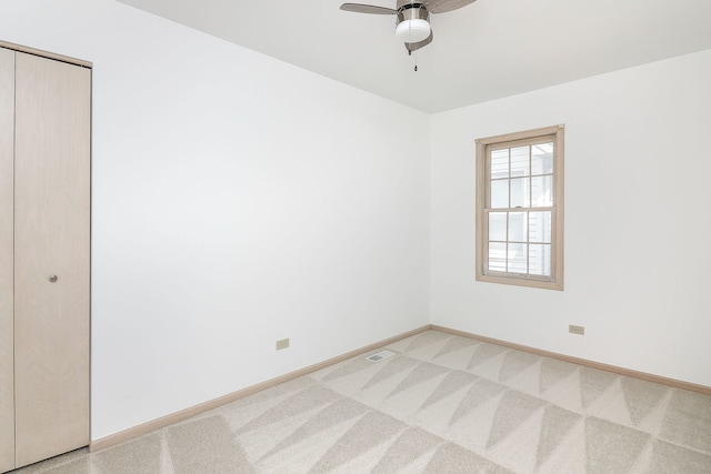 2007 Thornwood Cir, Saint Charles, IL 60174 - empty room with a ceiling fan and light carpet
