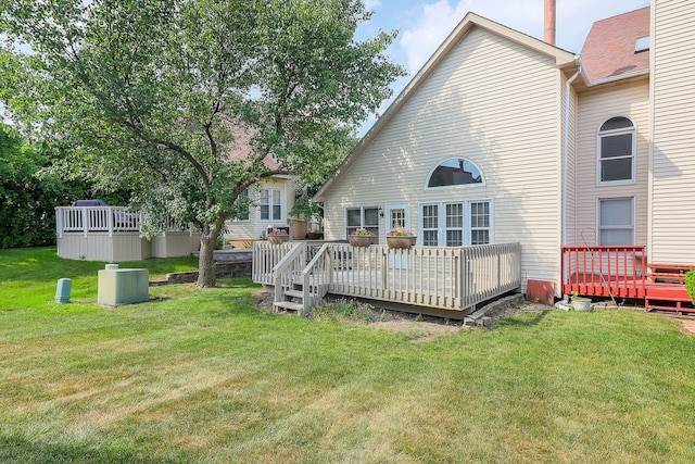2007 Thornwood Cir, Saint Charles, IL 60174 - back of house featuring a deck and a lawn
