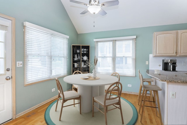 2007 Thornwood Cir, Saint Charles, IL 60174 - dining area featuring vaulted ceiling, a ceiling fan, and light wood-style floors