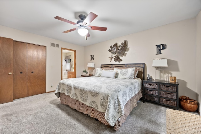 937 Wellington Cir, Aurora, IL 60506 - carpeted bedroom with a closet, a ceiling fan, and connected bathroom