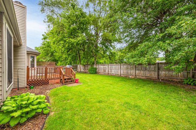 937 Wellington Cir, Aurora, IL 60506 - fenced backyard featuring a deck