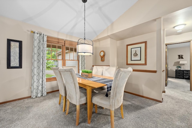937 Wellington Cir, Aurora, IL 60506 - carpeted dining room featuring baseboards and lofted ceiling