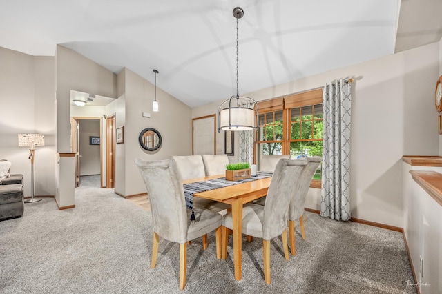 937 Wellington Cir, Aurora, IL 60506 - dining area with carpet flooring and lofted ceiling