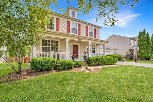 2420 Columbia Ln, Montgomery, IL 60538 - view of front of property featuring a porch and driveway