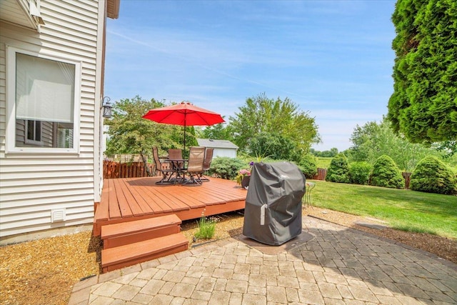 2420 Columbia Ln, Montgomery, IL 60538 - deck featuring a grill, outdoor dining area, a patio area, and a yard