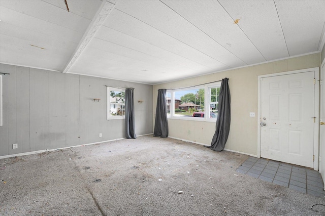 1616 Wilcox St, Crest Hill, IL 60435 - spare room with carpet flooring and wooden walls