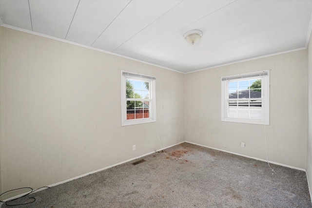 1616 Wilcox St, Crest Hill, IL 60435 - spare room featuring healthy amount of natural light, ornamental molding, and carpet flooring