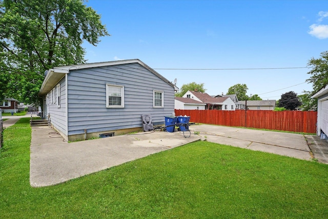 1616 Wilcox St, Crest Hill, IL 60435 - rear view of house with a patio area