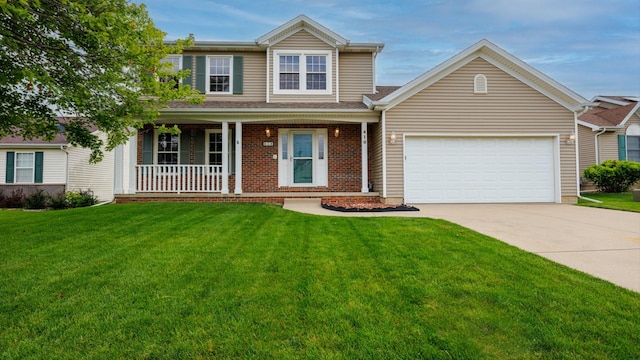 410 Wildberry Dr, Normal, IL 61761 - traditional home featuring covered porch, concrete driveway, an attached garage, and a front yard