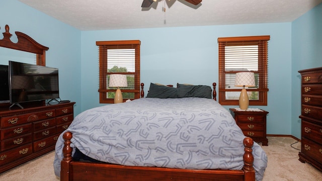 410 Wildberry Dr, Normal, IL 61761 - bedroom featuring light colored carpet and a ceiling fan