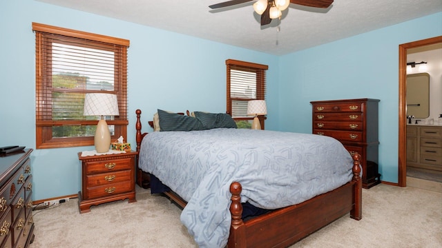 410 Wildberry Dr, Normal, IL 61761 - bedroom featuring light colored carpet, ensuite bath, and a ceiling fan