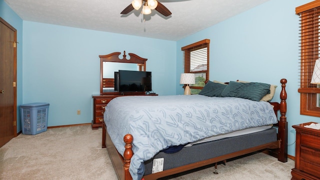 410 Wildberry Dr, Normal, IL 61761 - carpeted bedroom featuring a ceiling fan and baseboards