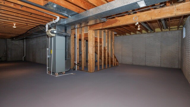 410 Wildberry Dr, Normal, IL 61761 - unfinished basement with heating unit and brick wall