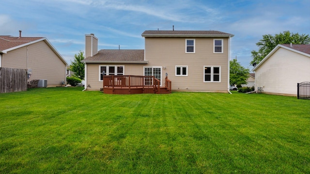410 Wildberry Dr, Normal, IL 61761 - back of property with a wooden deck, a chimney, and a shingled roof