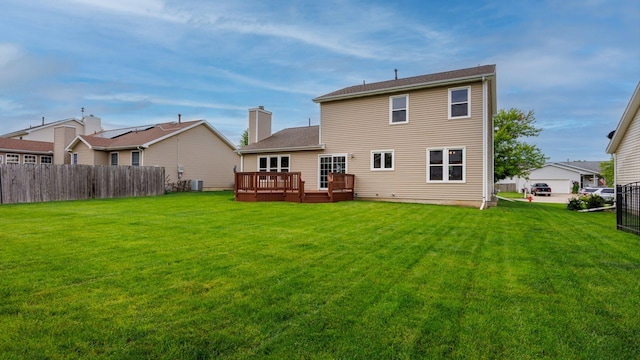 410 Wildberry Dr, Normal, IL 61761 - back of property with a wooden deck and a chimney