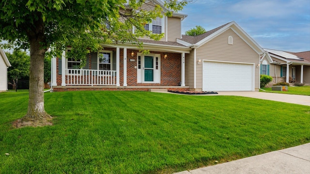 410 Wildberry Dr, Normal, IL 61761 - view of front of house featuring covered porch, an attached garage, driveway, and a front yard