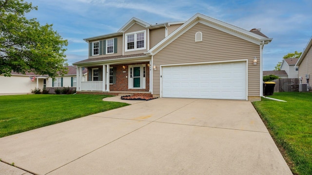 410 Wildberry Dr, Normal, IL 61761 - traditional-style home featuring a porch, driveway, brick siding, and a garage