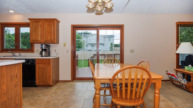 410 Wildberry Dr, Normal, IL 61761 - dining room featuring a chandelier and baseboards