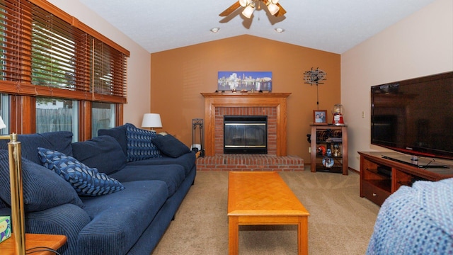 410 Wildberry Dr, Normal, IL 61761 - carpeted living room with a ceiling fan, vaulted ceiling, and a fireplace