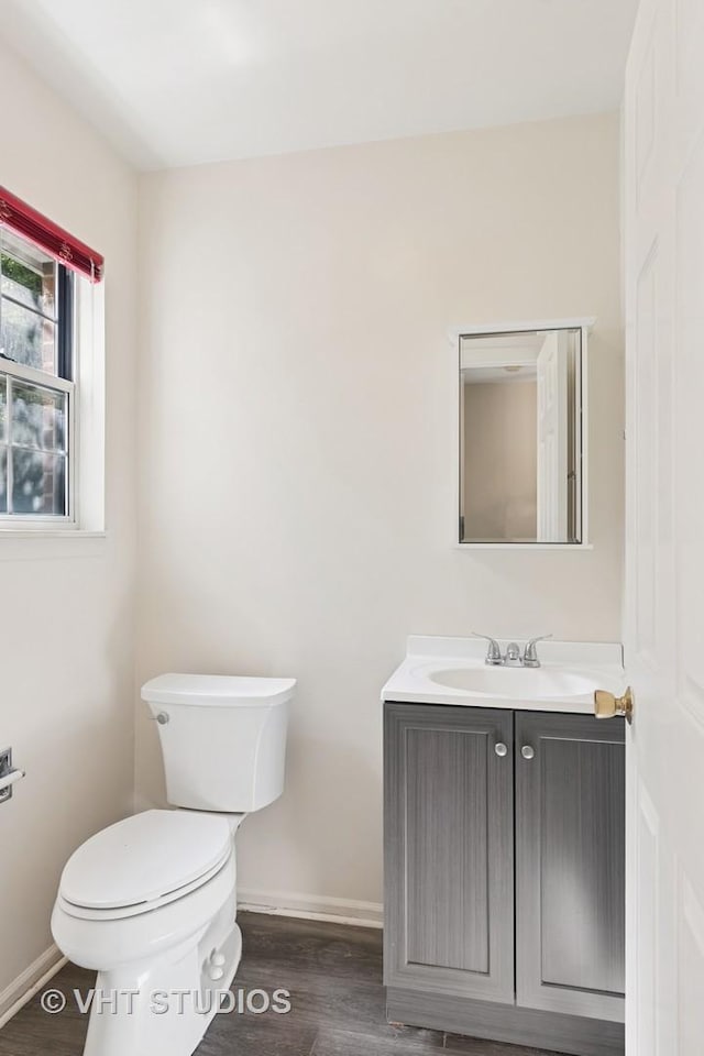 614 Hillview Ct, West Chicago, IL 60185 - half bath with vanity and wood finished floors