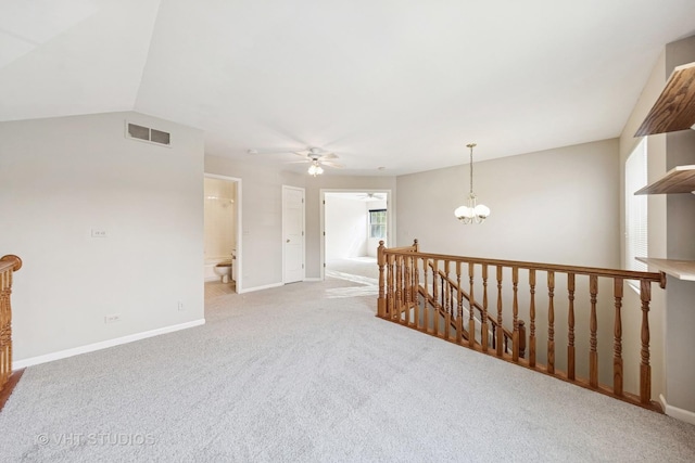 614 Hillview Ct, West Chicago, IL 60185 - unfurnished room with ceiling fan, light carpet, and a chandelier