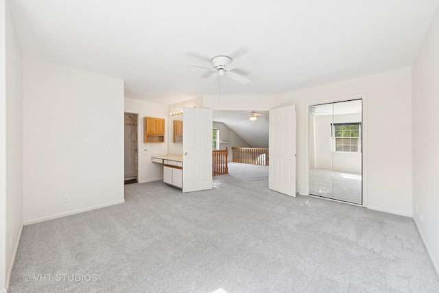 614 Hillview Ct, West Chicago, IL 60185 - unfurnished living room with a ceiling fan and light colored carpet