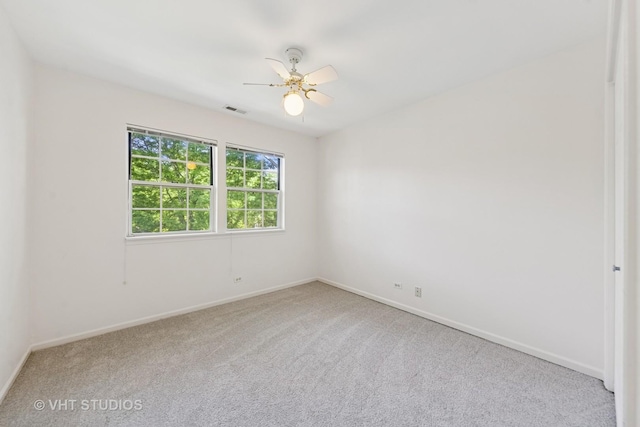 614 Hillview Ct, West Chicago, IL 60185 - empty room with carpet floors and ceiling fan