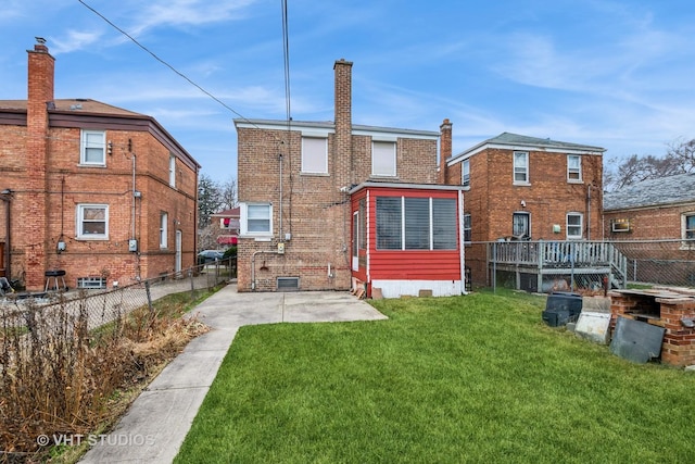 9739 S Ellis Ave, Chicago, IL 60628 - rear view of property featuring a patio, a chimney, and crawl space