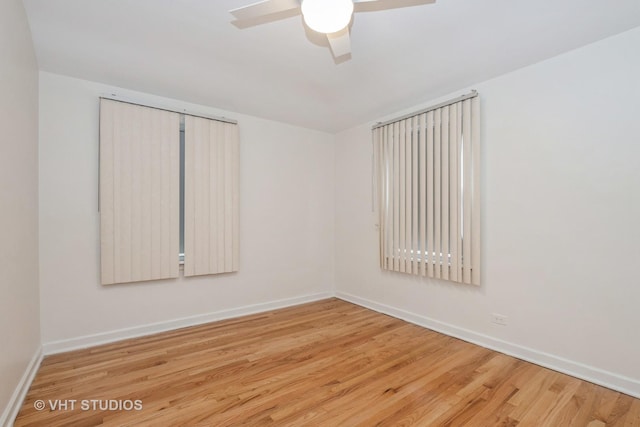 9739 S Ellis Ave, Chicago, IL 60628 - empty room featuring wood finished floors and ceiling fan