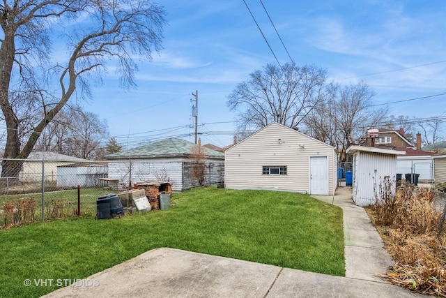 9739 S Ellis Ave, Chicago, IL 60628 - rear view of property featuring an outbuilding