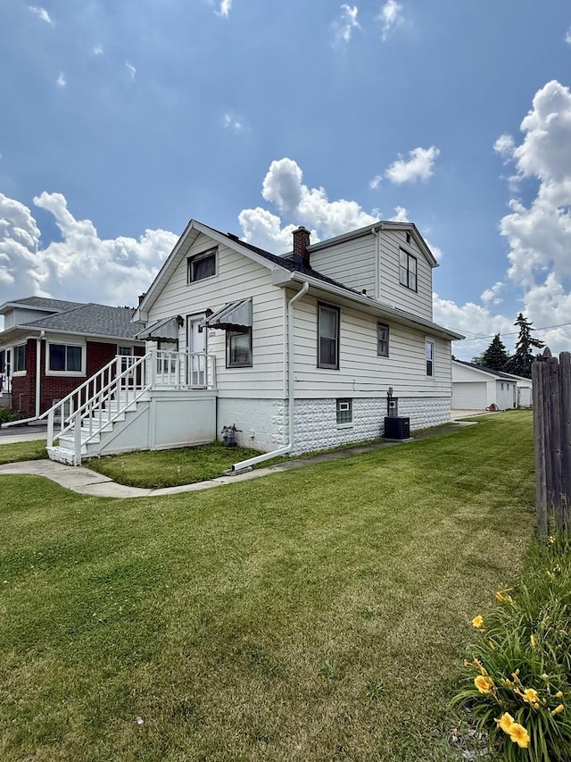 1221 Nicholson St, Joliet, IL 60435 - view of home's exterior featuring a chimney and a cooling unit