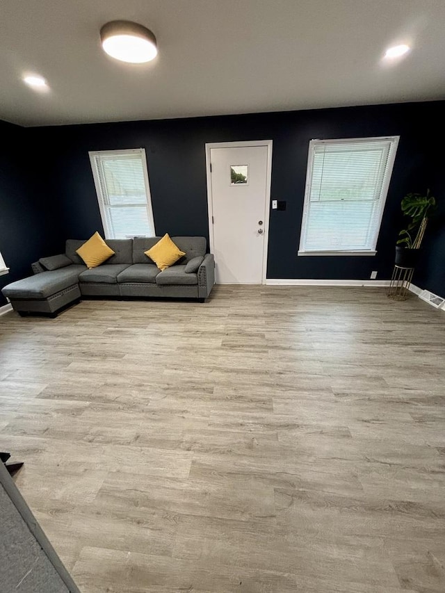 1221 Nicholson St, Joliet, IL 60435 - living area with healthy amount of natural light and wood finished floors
