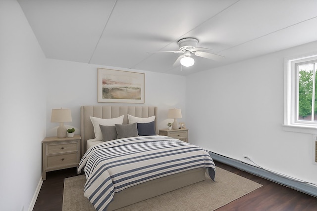 5011 Valley Ln Unit 201, Streamwood, IL 60107 - bedroom with a baseboard radiator, dark wood finished floors, and a ceiling fan