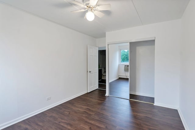 5011 Valley Ln Unit 201, Streamwood, IL 60107 - unfurnished bedroom with wood finished floors, a baseboard radiator, and ceiling fan
