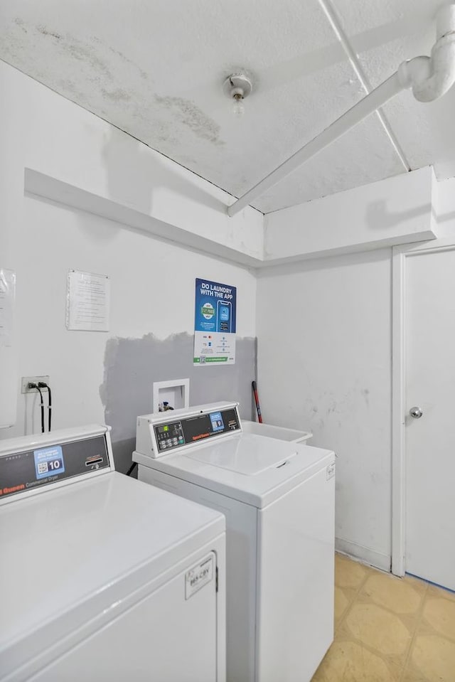 5011 Valley Ln Unit 201, Streamwood, IL 60107 - community laundry room with washing machine and dryer