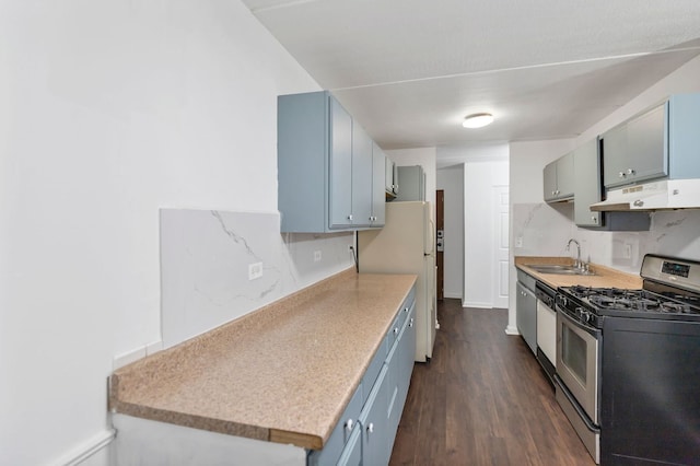 5011 Valley Ln Unit 201, Streamwood, IL 60107 - kitchen featuring white appliances, under cabinet range hood, dark wood-style floors, decorative backsplash, and light countertops