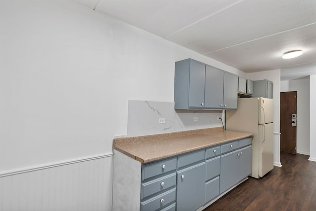 5011 Valley Ln Unit 201, Streamwood, IL 60107 - kitchen with freestanding refrigerator, dark wood-style flooring, gray cabinets, and light countertops