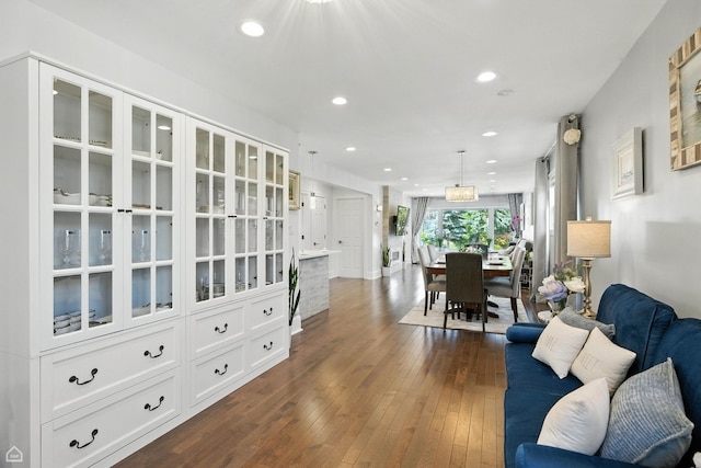 7515 W Roscoe St, Chicago, IL 60634 - living area featuring dark wood-type flooring and recessed lighting